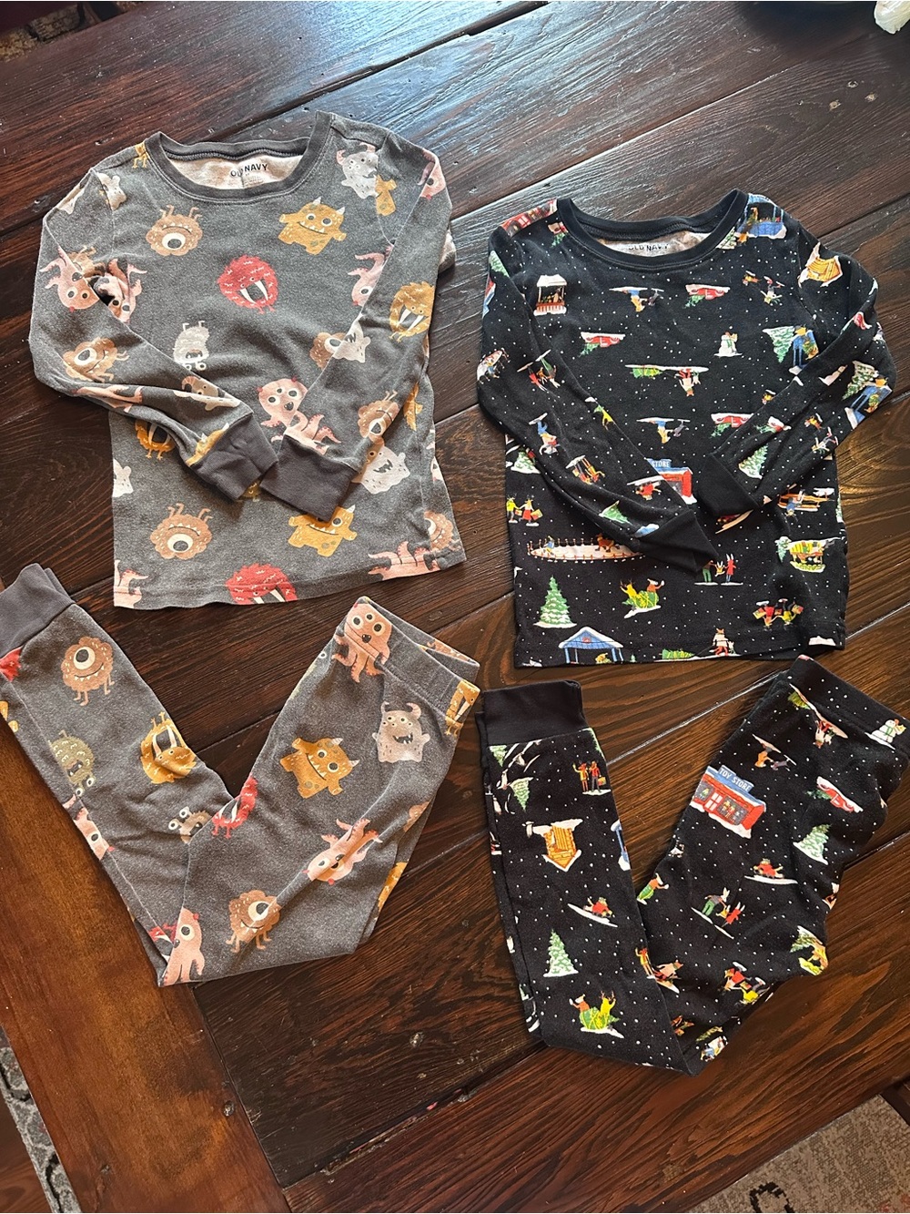 Old Navy Two-Pack Kids Pajama Sets - Gray Monster & Black Holiday Prints